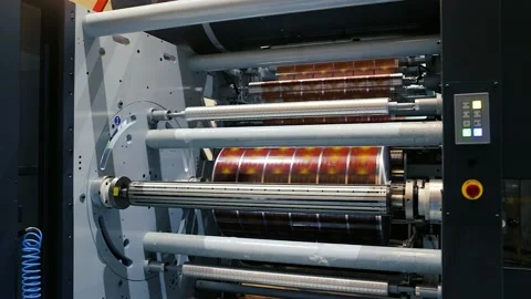 Flexographic machine with ink tray and varnish, ceramic anilox roll, Stock Footage 235908092