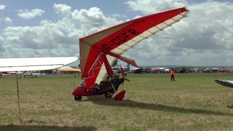 Flexwing Microlight Aircraft with Trike Parked in an Airfield Stock-Footage 75653465