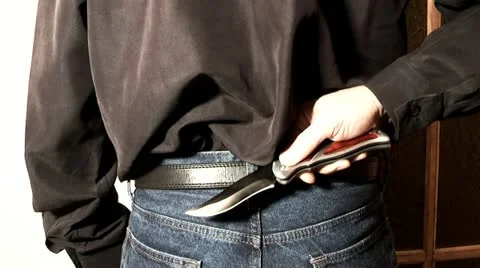 Flick-knife in the hands of a criminal weapon Stock Footage 21287582