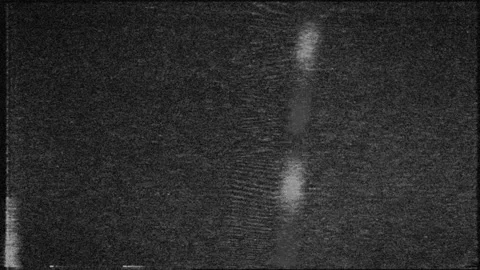 A flickering, analog TV signal. VHS retro recording video cassettes, TV channels Stock Footage 153314364