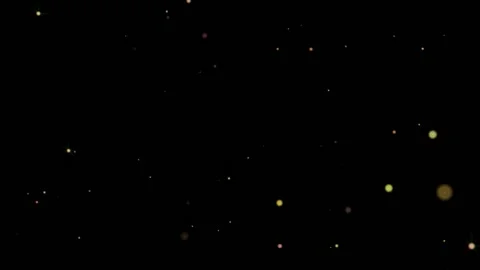 Flickering and continuous movement of golden lights on a black background. Stock Footage 153767797