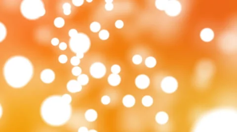 Flickering Bokeh Bubbles Particles random motion abstract background on orange Stock Footage 63820673