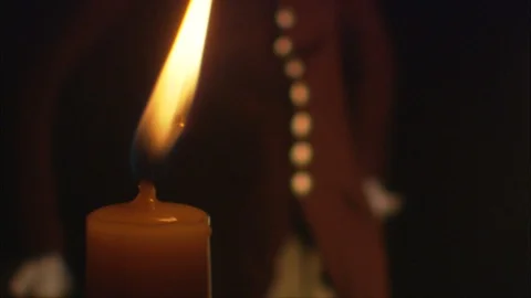 Flickering Candle in F.G. - Colonial Man in B.G. Stock-Footage 92036070