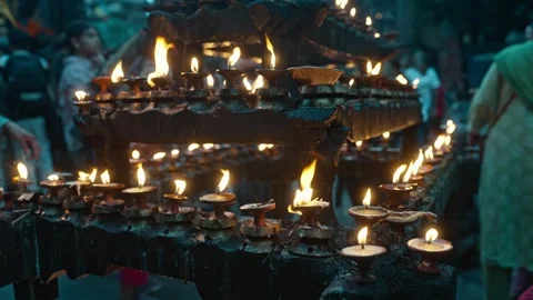 Flickering Candle Flames at Bhairav Shrine in Kathmandu Durbar Square Nepal Stock Footage 319071353