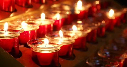 Flickering Candle Flames Inside Fara Church in Poznan, Poland Stock Footage 342867246