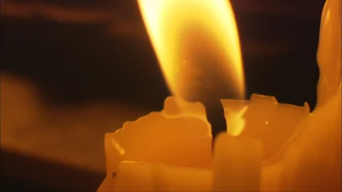 Flickering Candle on Historical tabletop Stock Footage 91391891