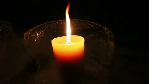 Flickering Candle in Ice Bowl Stock Footage 74806819