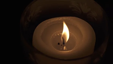 Flickering Candle in low light close-up 스톡 동영상 87554151