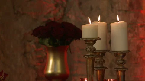 Flickering candles in loft-style interior Stock Footage 44158907
