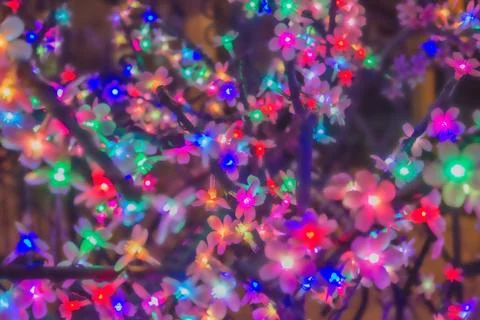 Flickering colored light bulbs. Stock Photos