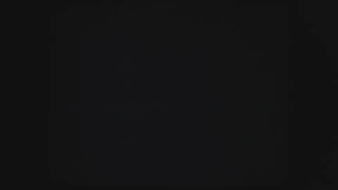 Flickering of computer language or information at dark background in monitor. Stock Footage 312099238