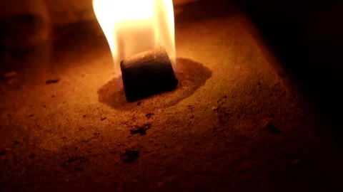 Flickering Flame In a dark room Stockbeeldmateriaal 163160141