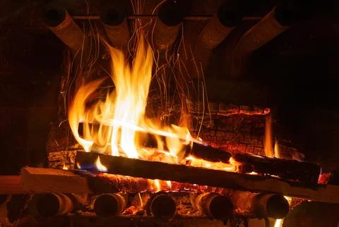 Flickering Flames of a Burning Fireplace Stock-Fotos