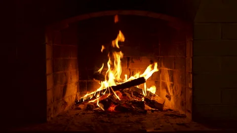 Flickering Flames Dancing in a Cozy Brick Fireplace. Stock Footage 283446911