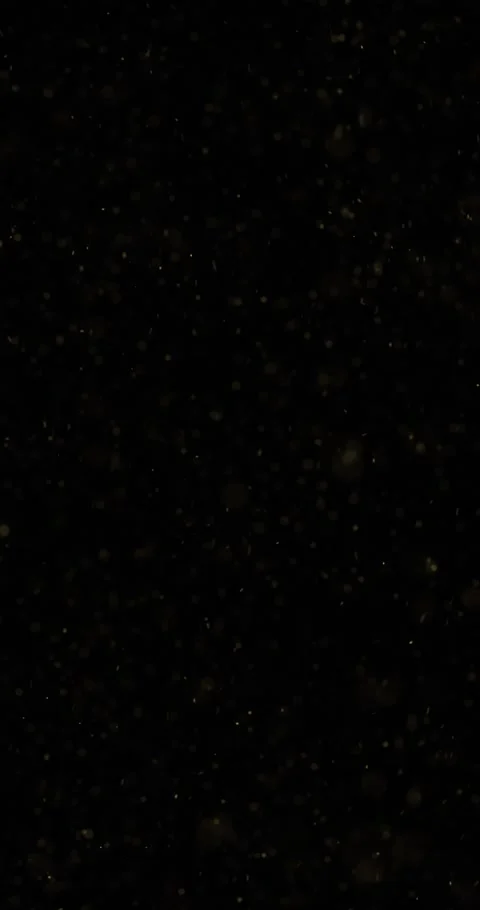 Flickering gold colored small dots on black vertical background Stock Footage 346784805