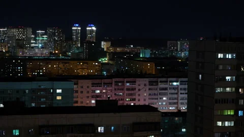 Flickering light in the windows of high-rise apartment buildings Stock Footage 189766837