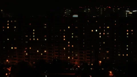 Flickering light in the windows of a multi-storey building Stock Footage 116720514