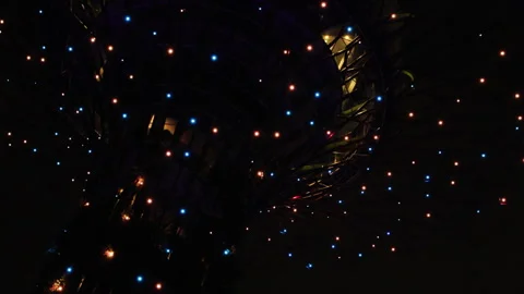 Flickering lights against night sky. Video stock 291009980