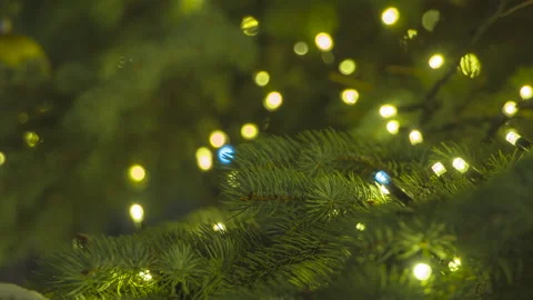 Flickering Lights on a Christmas Tree 4K Video stock 253316084