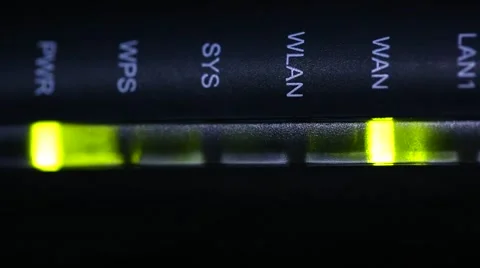 The flickering lights of the Internet equipment (Wi-Fi, Wireless router) on a da Stock Footage 61007577