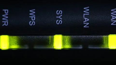The flickering lights of the Internet equipment (Wi-Fi, Wireless router) on a da Stock Footage 61007801