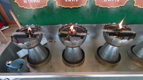 Flickering Oil Lamp Flame in Wind | Buddhist Spiritual Ritual and Symbol of Long Vídeo Stock 332942922