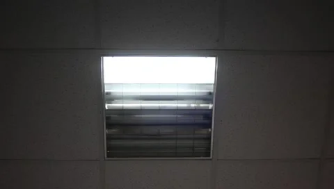 Flickering of old broken fluorescent light lamp Stock Footage 142328806