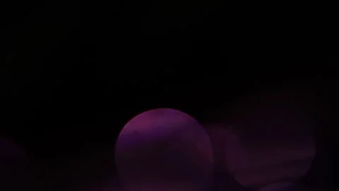 Flickering purple light at the bottom Stockbeeldmateriaal 309806962