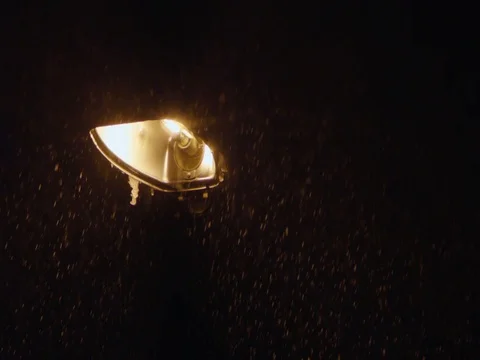 Flickering street lamp at snowfall Stock Footage 83081385