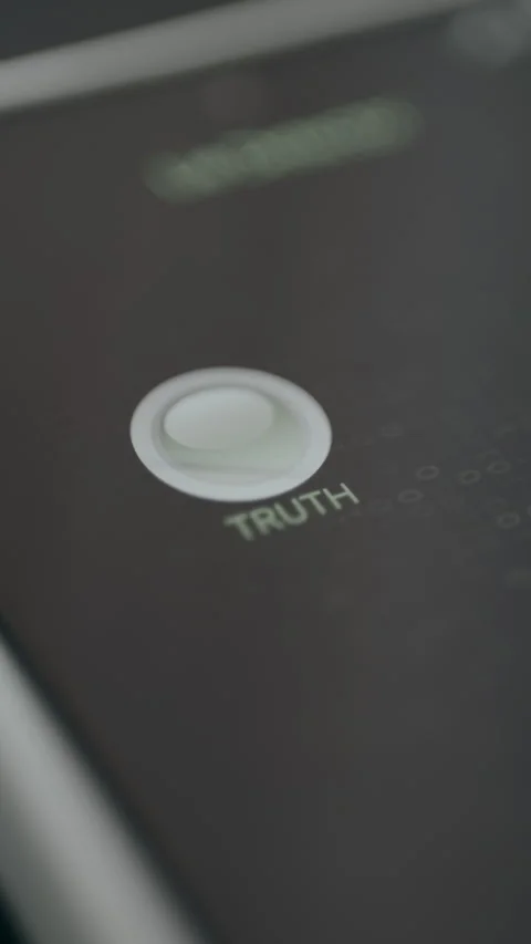 Flickering white digital button labeled TRUTH from a lie detector Stock Footage 329280082