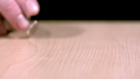 Flicking dime across table Stock Footage 93788127