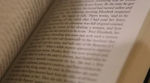 Flicking Through the Pages of a Book Stock Footage 46523566