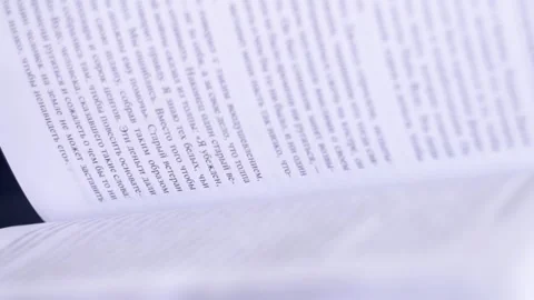 Flicking through the pages in the book Stock Footage 147499302
