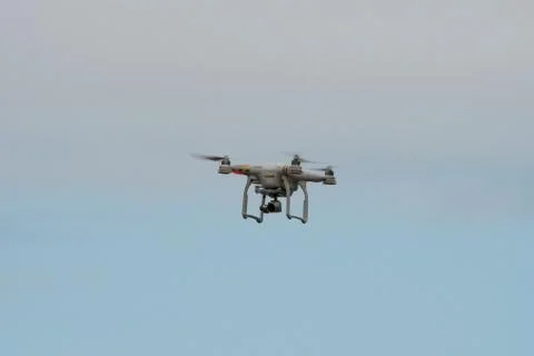 Flies drones in the summer sky Stock Photos
