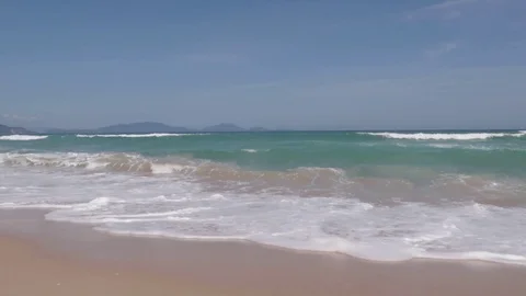 Flies over a beautiful beach overlooking the waves, horizon, Vietnam Stock Footage 115724883
