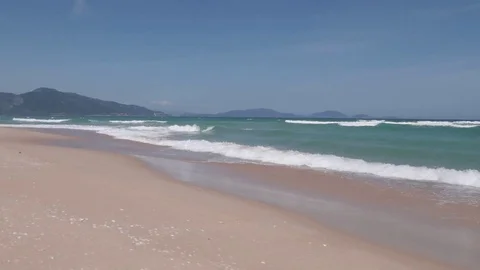 Flies over a beautiful beach overlooking the waves, horizon, Vietnam Stock Footage 115724914