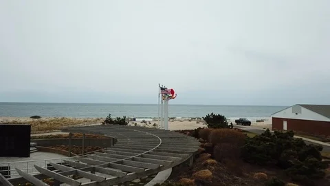 Flight 800 memorial drone fly-to waving flags Stock Footage 106039710