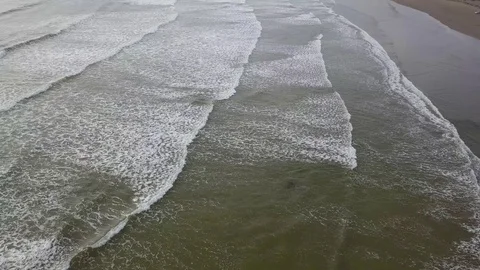 Flight above beach and waves, reveal shot in Ireland, County Donegal Stock Footage 90031260