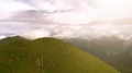 The flight above the beautiful mountain with people 4k or 4k+ Resolution