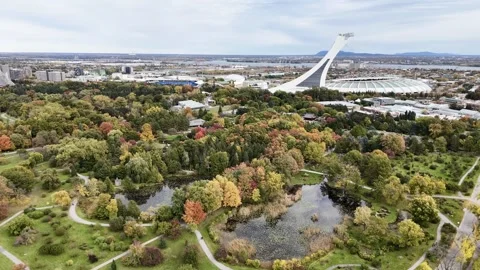 The flight above the Botanic garden and Olympic stadium. Montreal, Quebec, Stock Footage 292481324