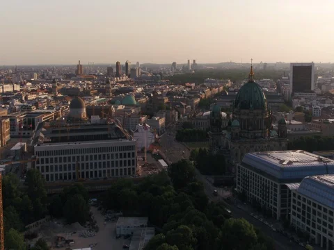 A flight above central Berlin during a summer day, palace and Dom, aerial. Video stock 79971388