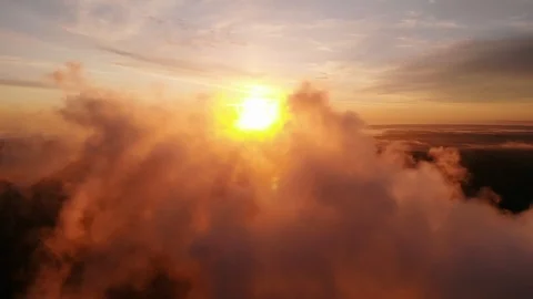 Flight above clouds at dawn drone shot Stock Footage 109964064