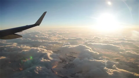 Flight Above Clouds during sunset Stock Footage 233729063