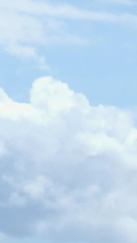 Flight above the clouds offering a serene view of the beautiful blue sky from Stock Footage 344785614