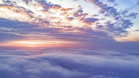 Flight above the clouds. Stock Photos