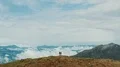 The flight above a couple on the beautiful mountain 4k or 4k+ Resolution