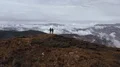 The flight above a couple on the mountain 4k or 4k+ Resolution