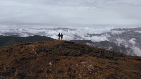 The flight above a couple on the mountain Stock-Footage 116081792