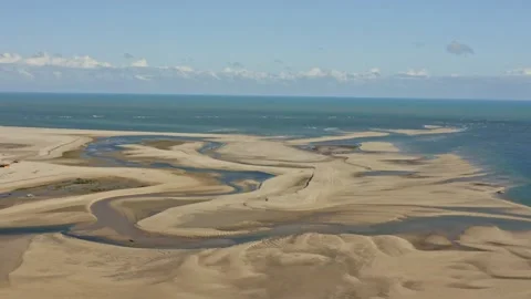 Flight above empty Macapa beach water canal pattern during low tide; drone Vídeos de archivo 203925383