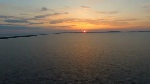 Flight above estuary in evening Stock-Footage 131551640